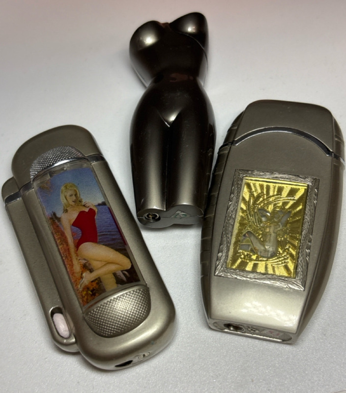 Three Risqu&eacute; Butane Lighters