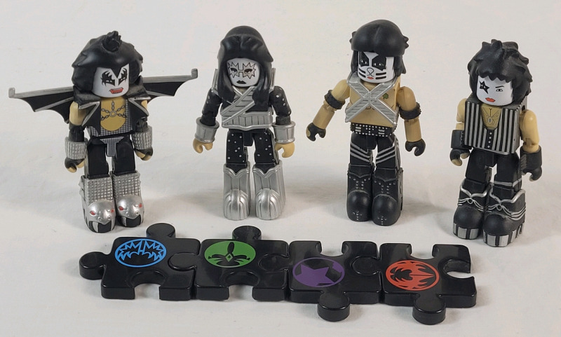 2002 KISS Art Asylum Mini-Fig Set w/Puzzle Pieces . Measures 3.5" Tall Each