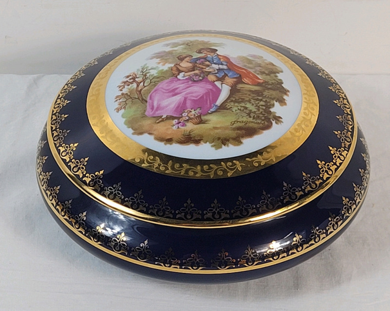Vintage Limoges Fragonard Porcelain Trinket Box . Measures 6" diameter & 3" tall . No chips or cracks