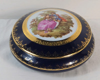Vintage Limoges Fragonard Porcelain Trinket Box . Measures 6" diameter & 3" tall . No chips or cracks