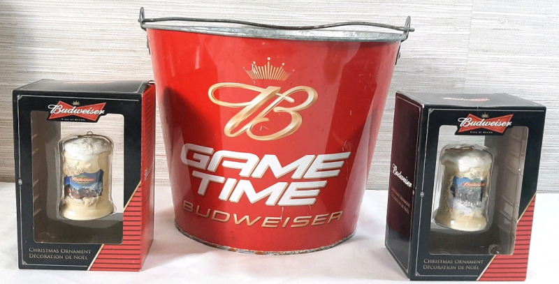 Lot of Budweiser Memorabilia | Includes 2 2008 Christmas Ornaments & Metal Bucket | Ornament Packaging Measures 5&frac12;" Tall, 3" Wide, Bucket Measures 7" Tall, 10" in Diameter