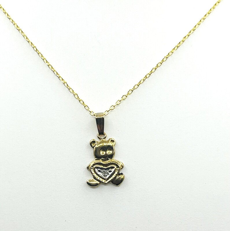 NEW 10KT Yellow and White Gold Natural Diamond (0.01ct) Teddy bear holding heart Pendant with Gold Plated Sterling Silver Chian, W/A $360.00 (with appraisal) Diamond is the birthstone for April.