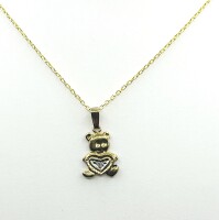 NEW 10KT Yellow and White Gold Natural Diamond (0.01ct) Teddy bear holding heart Pendant with Gold Plated Sterling Silver Chian, W/A $360.00 (with appraisal) Diamond is the birthstone for April.