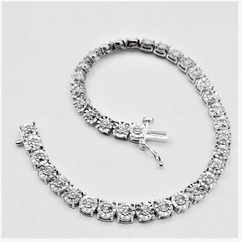 NEW Sterling Silver Natural Diamond (0.10ct) Bracelet, W/A (with appraisal) $500.00. Diamond is the birthstone for April.