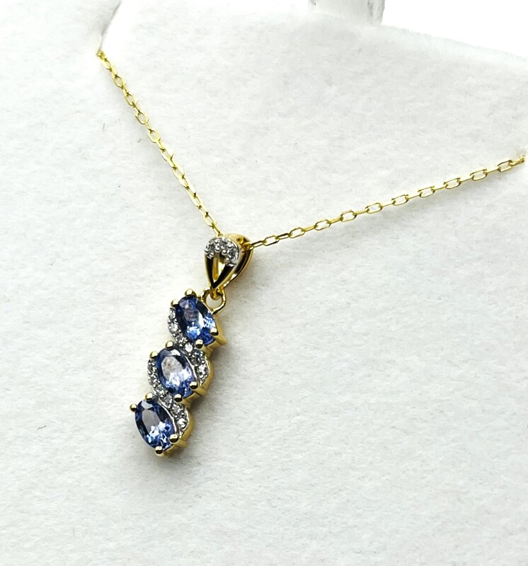 NEW Gold Plated Sterling Silver Natural Tanzanite (0.75ct) and CZ (0.10ct) Pendant with Gold Plated Sterling Silver Chain, W/A (with appraisal) $450.00. Tanzanite is the birthstone for December.