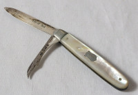 Antique 1901 Silver Pocket Knife w/Mother of Pearl Handle . Measures 4 1/4" long when open .