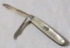 Antique 1901 Silver Pocket Knife w/Mother of Pearl Handle . Measures 4 1/4" long when open .