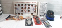 Lot of Sports Memorabilia | Includes Team Canada 2002 Pin Collection (4 Pins Missing), 2003 McDonalds Eric Moulds Collectors Edition Figure, Miniature Baseball Helmets, Vintage Patches and Banners, 2 Talking Bottle Openers & Football Candy Dispenser