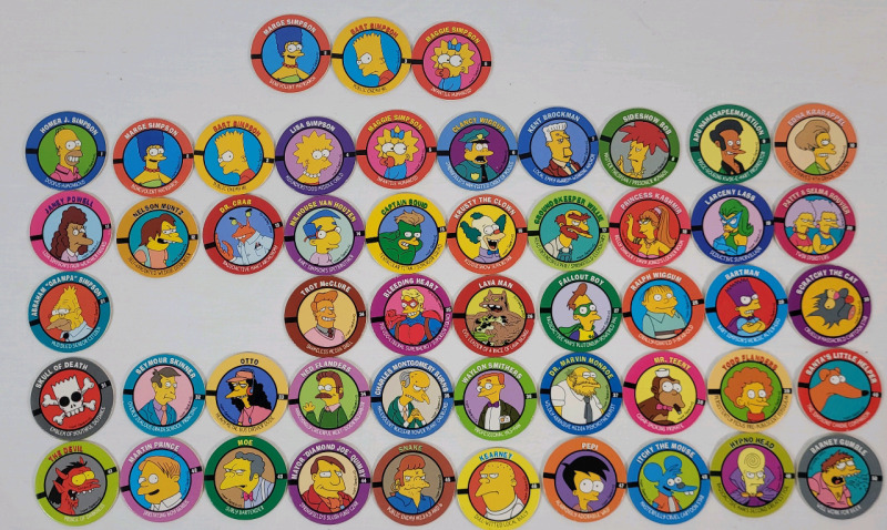 1994 Skybox The Simpsons Skycap Pogs . 50 Pogs , Complete Set . See last photo for #22 & #23