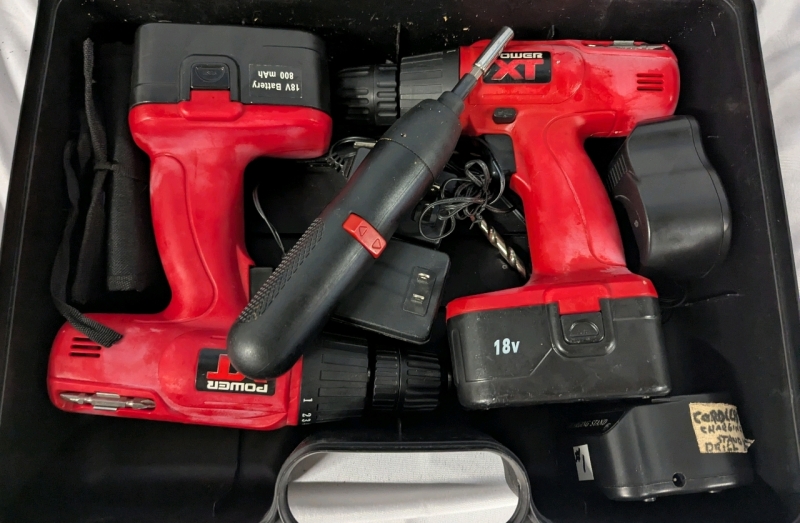 Cordless Tool Lot. 2 Power XT Cordless Drills, with 2 Batteries and Chargers& 1 Jobmade Cordless Screwdriver. Drilss tested and working. No plug for screwdriver, unable to test. Comes with Case.