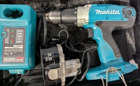 Makita 18v Impact Drill with Case, Battery & Charger. Tested working. Case Measures 13" Tall.