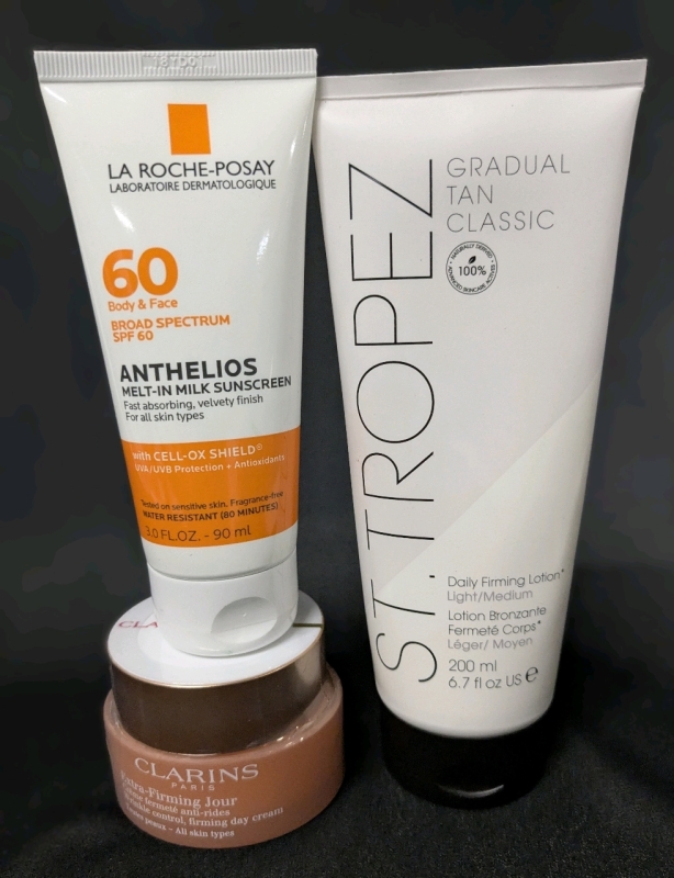 [See Desc] 3 Skincare Products: LA ROCHE-POSAY Broad Spectrum 60SPF Anthelios Melt-In Milk Sunscreen, CLARINS Extra-Firming Cream, ST TROPEZ Gradual Tan Classic Daily Firming Lotion.