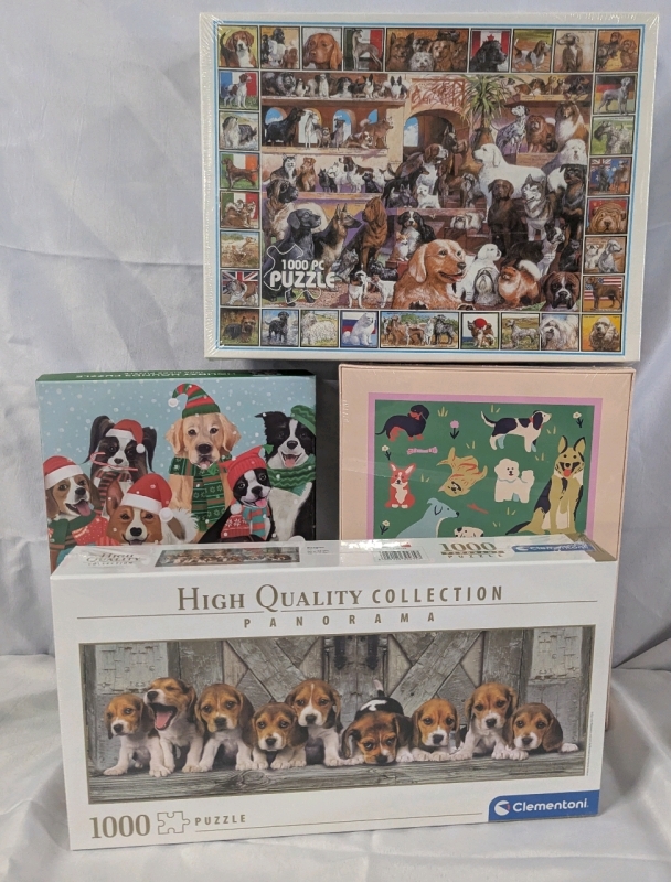 4 New 1000 Piece Dog Puzzles. Various Sizes and Manufacturers.