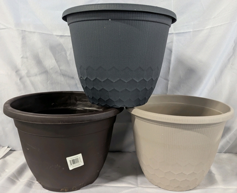 3 New Plastic Planters. 9.5" Tall