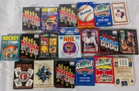 19 Packs of Playing Cards. Some Sealed, Some not. Pimarily Sports, and Popculture Themed.