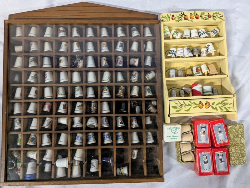 90+ Thimbles with Cases.. Includes Disney, Wizard of Oz and More. Largest Case Measures 18" Tall.