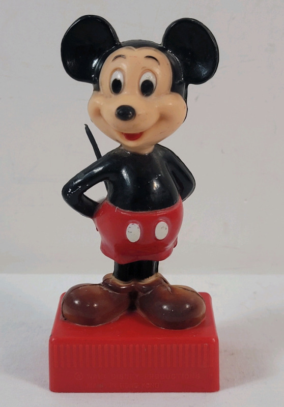 Vintage Walt Disney Mickey Mouse Double Hole Pencil Sharpener . Measures 4 &frac34;" tall .