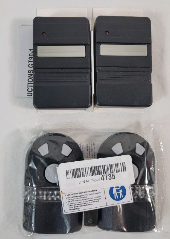 Four (4) New Replacement Garage Door Openers .