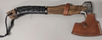 As New Hatchet with Leather Like Cover. Some Pattern Wear and Light Rust spots on Axe Head.