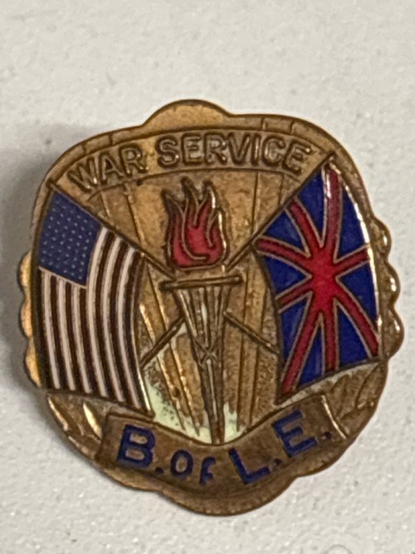 WWW1 Brotherhood of Locomotive Engineers Pun Canada United States World War One Dime placed for size comparison