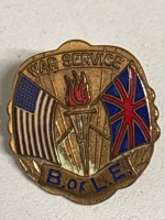 WWW1 Brotherhood of Locomotive Engineers Pun Canada United States World War One Dime placed for size comparison