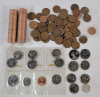 Canadian Coin Lot . Includes : 1967 Silver Dime , Two (2) Rolls 1999 Uncirculated Pennies plus various Quarters , Nickels & Pennies