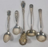 Five (5) Sterling Silver Serving Spoons . Measures 3 ⅞" to 6 &frac34;" long .
