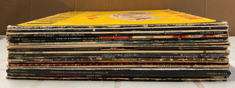 20 CLASSIC ROCK LPs | Includes Rolling Stones, CCR, Santana, ZZ Top and others | See Photos for Titles | Scuffs and Scratches Present