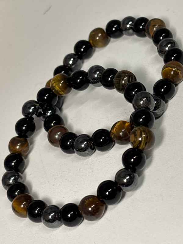 Two Flex Triple Protection Bracelets Obsidian ProHematite Tiger's Eye and Obsidian Bangle Stock photo added