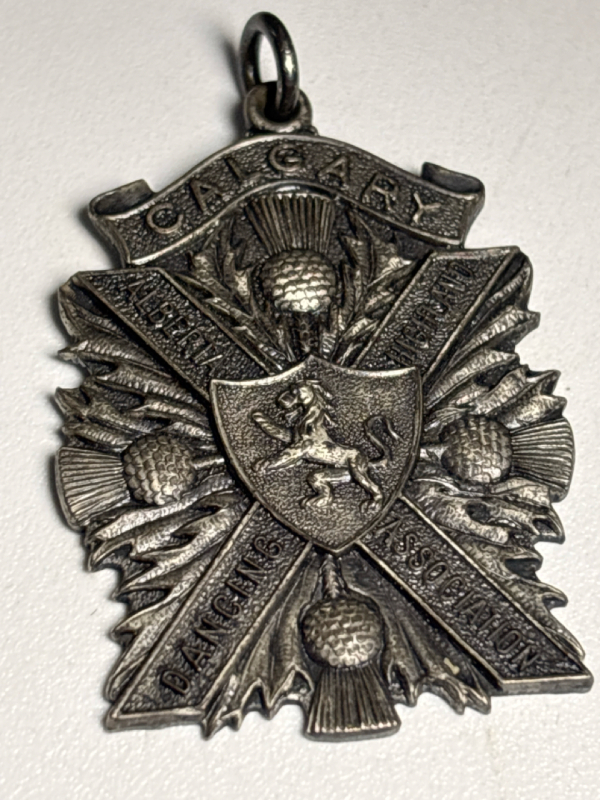 BIRKS Sterling Silver Calgary Dancing Medal Marked BIRKS Sterling on reverse Named and Dated 1955 Calgary Alberta Highland Dancing Association approximately 1.5 inch