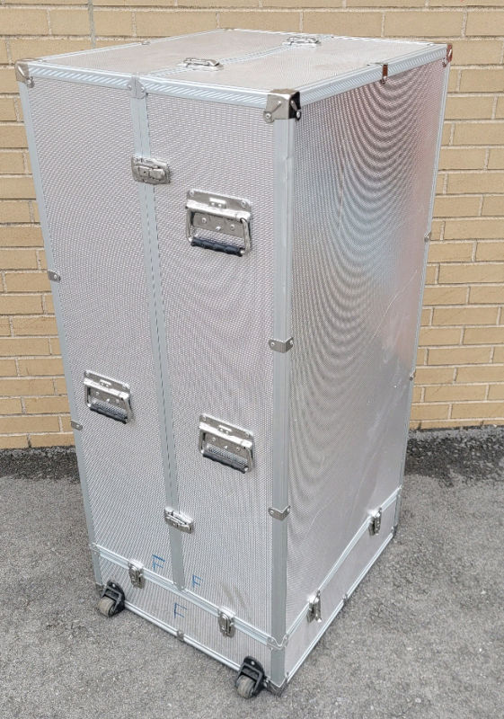 3pc. Metal Protective Case on Wheels w/Some Padding on Interior . Measures 21"&times;24"&times;49" . Small Dent on Bottom Side