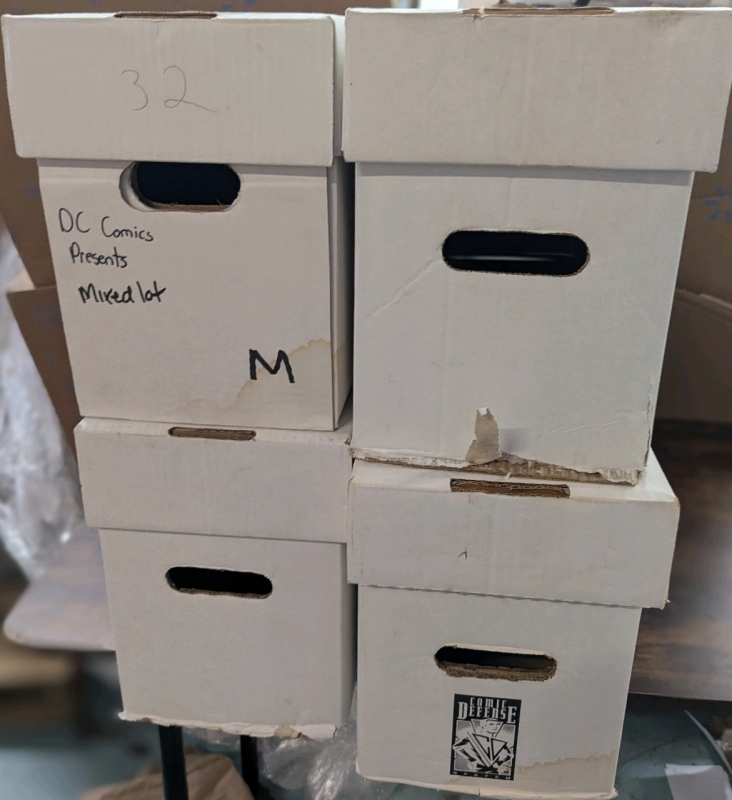 4 Comic Longboxes. Holds 250-300 Comics Each. 27.5" by 8.5" by 11".