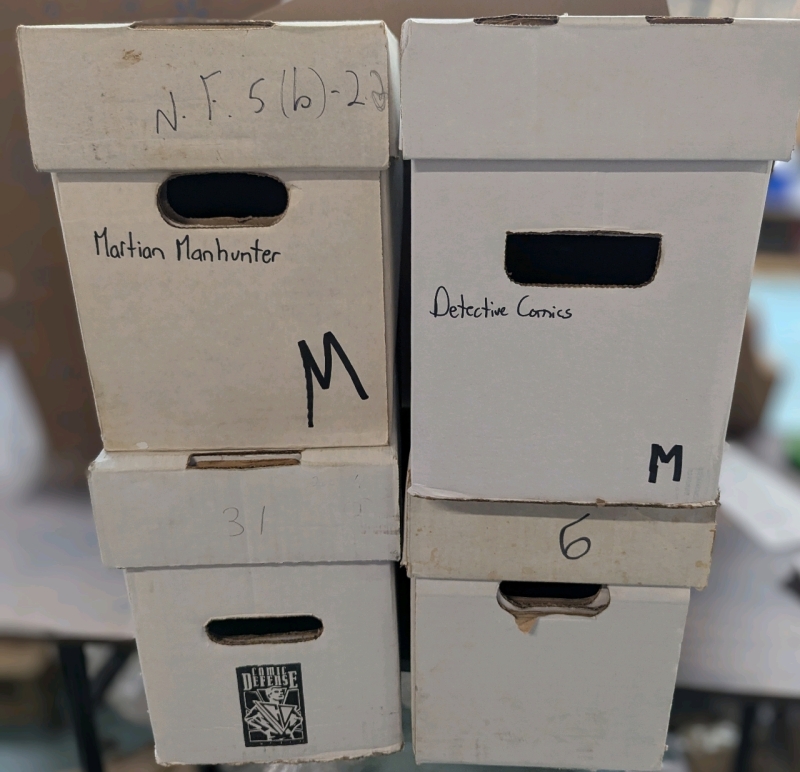 4 Comic Longboxes. Holds 250-300 Comics Each. 27.5" by 8.5" by 11".