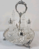 James Dixon & Sons 5pc. Crystal & Silverplate Cruet Set . Small Chip on one glass stopper