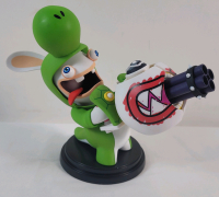 New - Mario + Rabbids Kingdom Battle " Rabbid Yoshi " Figurine . Measures 6" (H) &times; 4" (W) &times; 8.5" (D).