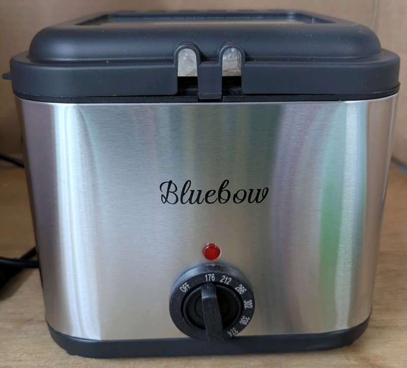 As New Bluebow 2.5L Deep Fat Fryer, 1000W Compact Deep Fryer with Temperature Control, Stainless Steel Basket And Viewing Window, Non-Stick Oil Tank. Retails for $109 <br/>
