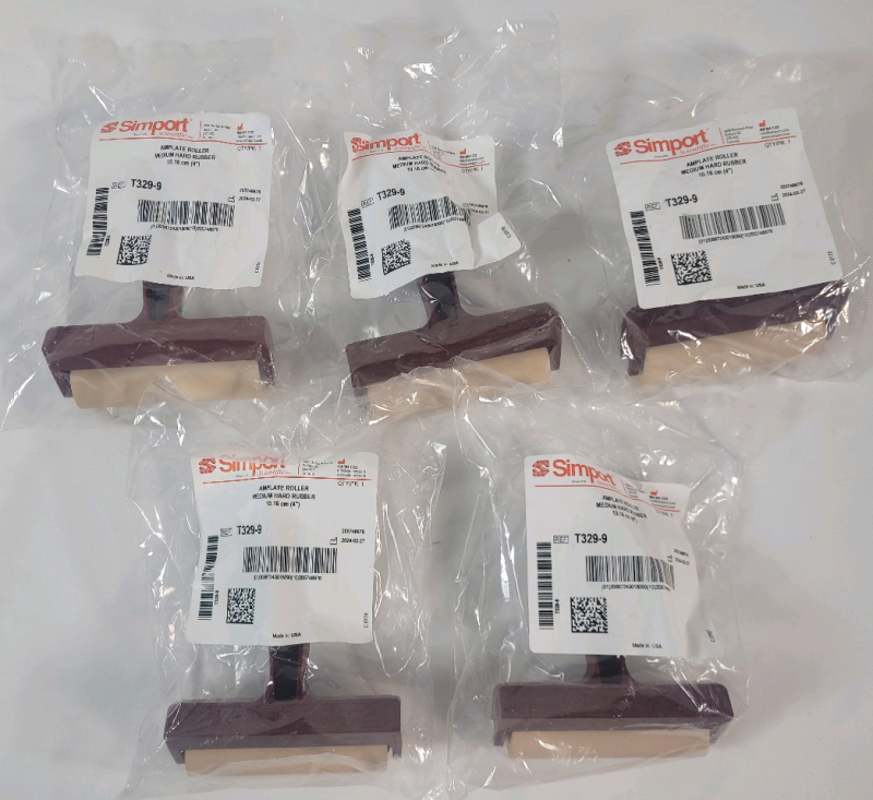 5 New Simport Amplate Roller - Medium Hard Rubber . Measures 4" Across .