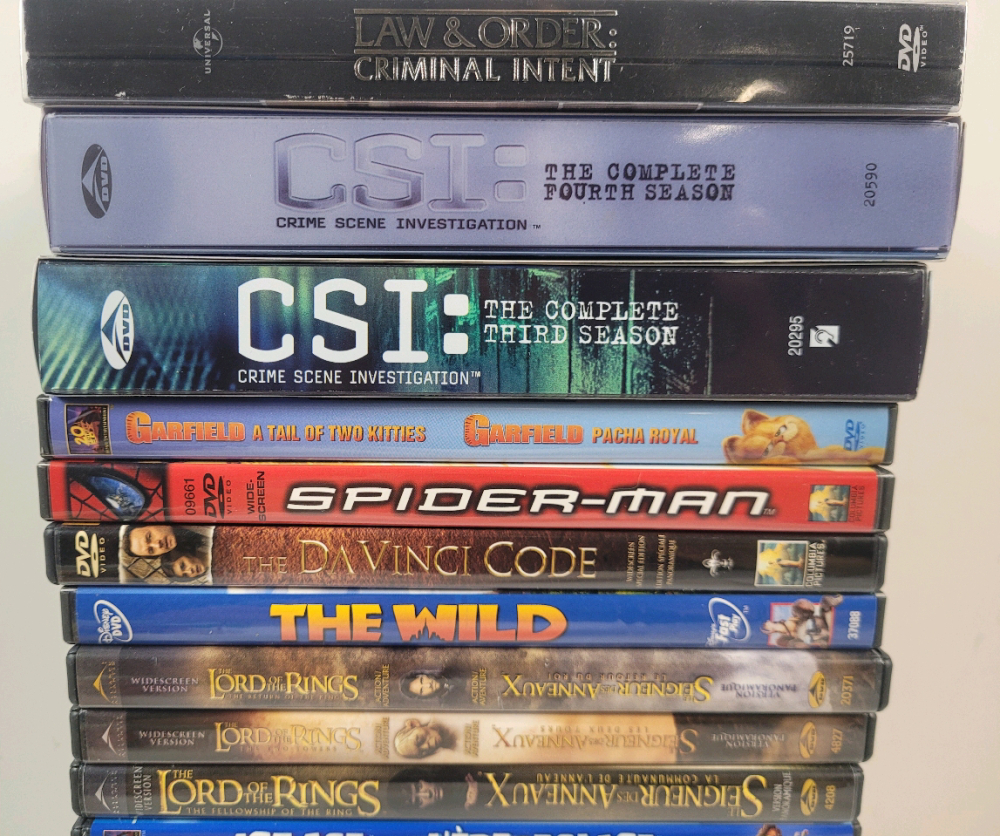 Dvd In 2000 19 DVD Copies of 2000's Movies and TV Shows, Including The Lord of The ...