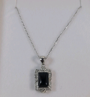 Sterling Silver Black Onyx and CZ Pendant with Sterling Silver Chain, Retail $200.00.