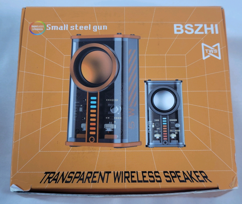 As New - BSZHI Small Steel Gun Transparent Wireless Speaker . Measures 3 ⅝" tall . Amazon Return , Tested Working