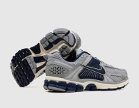 New in Box Size 9.5 Men's Nike Zoom Vomero 5 Vast Grey / Blue Void - Wolf Grey. Retails for $210