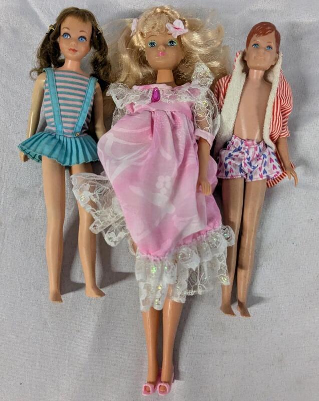 3 Dolls. Vintage Hasbro's Mom's Secret Suprise Doll and Barbie's Ricky and Skipper Dolls.