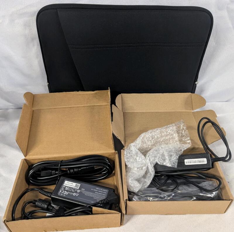 As New Laptop Accessories Lot. Protective Sleeve & 2 Power Adaptors.