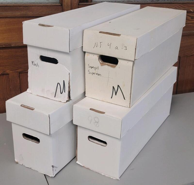 4 Comic Longboxes. Holds 250-300 Comics Each. 27.5" by 8.5" by 11".