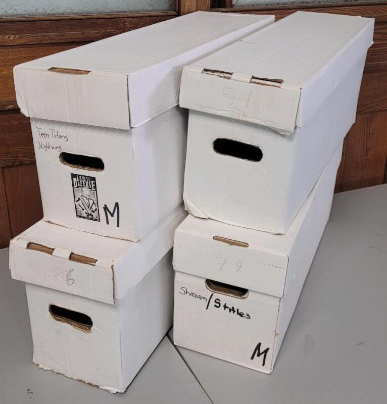 4 Comic Longboxes. Holds 250-300 Comics Each. 27.5" by 8.5" by 11".