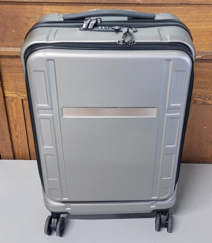 Walmart Return - Travel Carry-On Luggage on Wheels w/Extension Handle . Small Bend Bottom Corner & Top . Never Used .