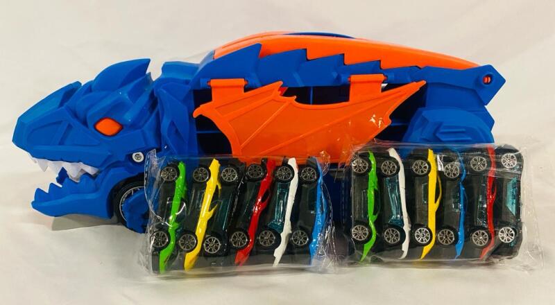 As-New Dinosaur Planet Dinosaur Truck; Comes with 12 Cars, Ages 3+