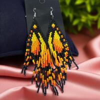 Stylish Earrings Featuring a Bohemian Vintage Design with Vibrant Yellow Orange Black Butterfly Wing Patterns Handcrafted with Glass Seed Beads Sheppard Hooks Approx 4.5 inch drop Reminds me of Monarchs dancing on your ears