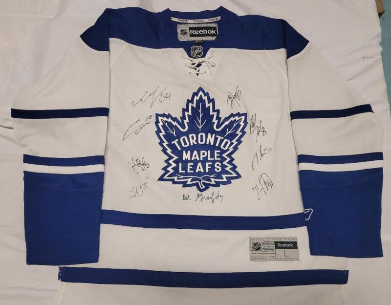 Walter Gretzky Signed Toronto Maple Leafs Jersey plus Eight (8) More Signatures . No COA for Signatures . Size Large Jersey