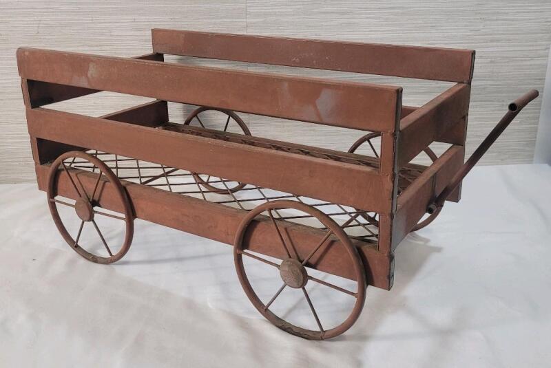 Home Decor Plant Stand Metal Wagon . Measures 19.5"&times;9 &frac34;"&times;10.5" . Wheels do not rotate .